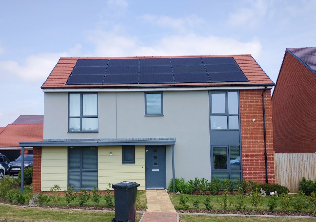 Embedded in-roof 4.87kW array with Tesla Powerwall battery and car charger