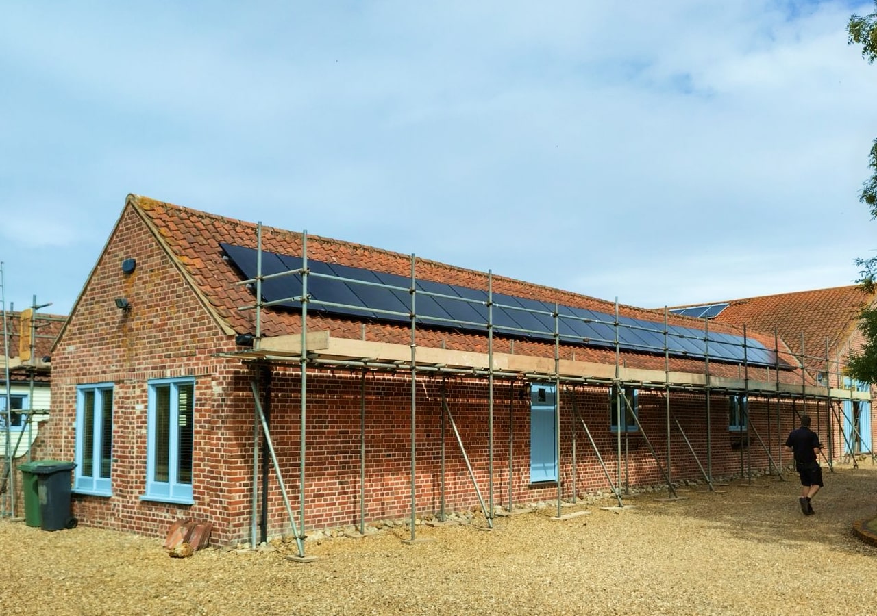 On-roof 17.28kW array on barn conversion with two Tesla Powerwall batteries and EV charger